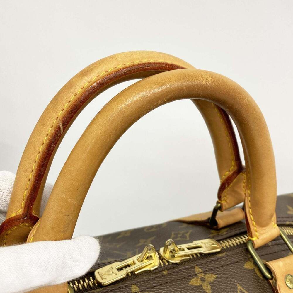 LOUIS VUITTON Brown Monogram Keepall 60 Boston Bag - Picture 8 of 11
